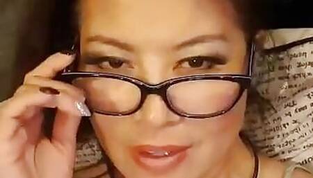 Mature asian milf fingering her pussy