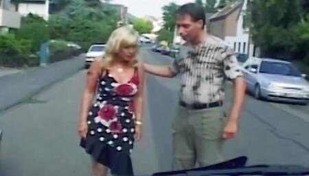 Natural titted German lady pleasing a cock in the back of the car
