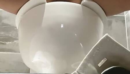 Jacking off in the bath room at work