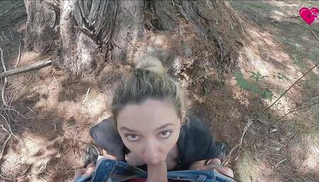 She sucks me behind a pine tree
