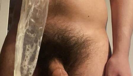 20 years old college boy jerking off and cumming in condom