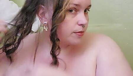 Peachesandstring washing her hair in the shower