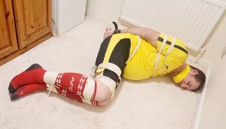 Preview of footballer tied up for over 7 hours 1 -BBW domination, BBW bondage,bound and gagged man,man tied up,amateur,male bondage,man in bondage,soccer kit,football kit,socks,rope bondage,gay bondage,