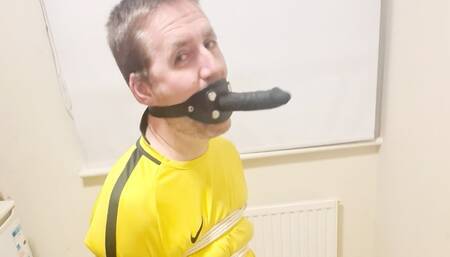 Dildo gagged footballer -BBW domination, BBW bondage,bound and gagged man,man tied up,amateur,male bondage,man in bondage,soccer kit,football kit,socks,rope bondage,gay bondage,dildo gagged,
