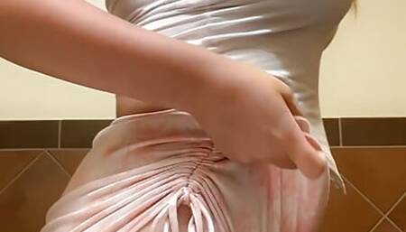 Stripping down in a public bathroom