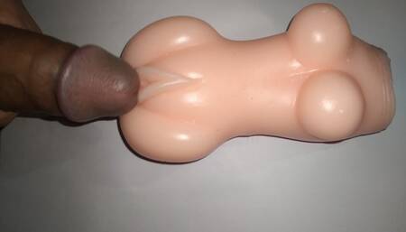Sex doll dick rubbing.