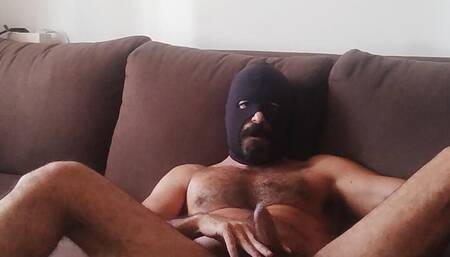 Masked daddy open his legs and jerk off watching porn