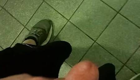 Wank in public WC station