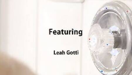 Leah Gotti steps into the shower and turns on the warm water. She takes her time soaping up beneath the