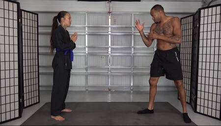 MEIKO EARNS HER RED KARATE BELT