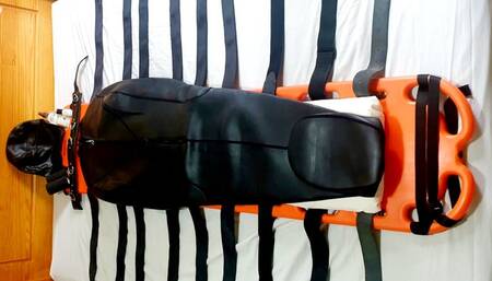My new neoprene sleepsack and backboard all layed out for tonight's unfortunate victim-BBW domination,BBW bondage,amateur,man in Bondage,male bondage,sleep sack,man tied up,backboard,neoprene sleepsack,strapped down