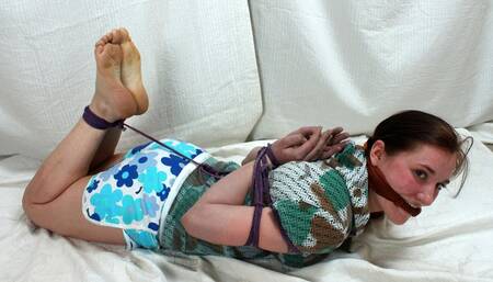 Ruby: cleave-gagged barefoot girl in top and shorts, hogtied with her hands in reverse prayer, gets her feet oiled and tickled (HD MP4)