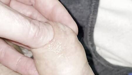sliding my thumb in my uncut dick
