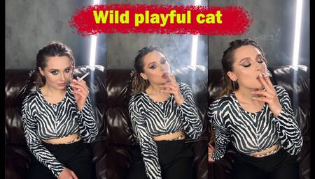 Wild cat Yana lights up her red Marlboro