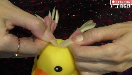 What is stronger nails or plastic toy: score 1:1