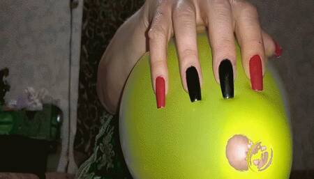 Red and black nails against balloons WMV(1280*720)HD