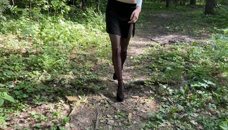 a girl in the forest twisted her leg and it hurts a lot, she does a massage and climbed over the mountains on one foot