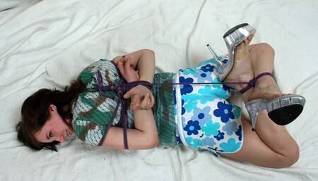 Ruby and Ruth: girl in high heels, t-shirt and shorts, hogtied with her feet crossed, is tickled by her roommate (HD MP4)