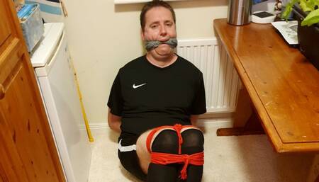 Footballer in black kit kept bound and gagged in my isolation room 1-BBW domination,BBW bondage,amateur,male bondage,bound and gagged man,man in bondage,soccer kit,football kit,socks,rope bondage,gay bondage,socks,man tied up,