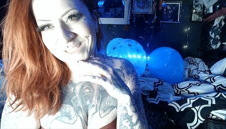 Tattooed Girl Inflating a Mini-Pool and Beach Ball