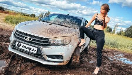 CAR STUCK Ellies hot day with bald tires in the mud