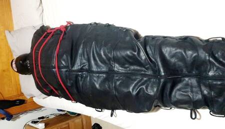 Edging a man in leather sleepsack-BBW domination,BBW bondage,handjob,edging,edged,amateur,Sam,leather sleepsack,male bondage,man in bondage,man tied up,cock ring,polishing,