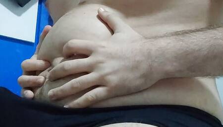 Chubby guy cumming sitting on bed