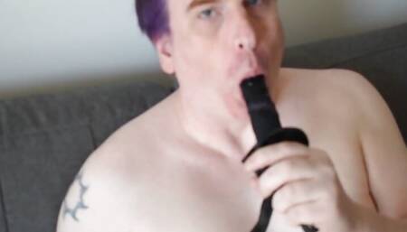 A Male submissive Sucking His Dildo.
