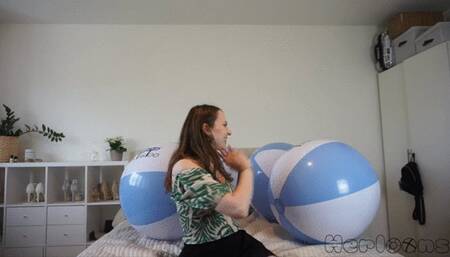 Saskia pops big Ticktacktoo beach balls