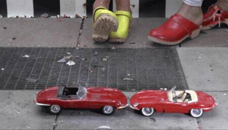 Nice model cars under merciless wooden clogs