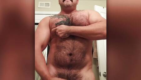 Hairy latin muscle jerks off at gym bathroom with cum shot