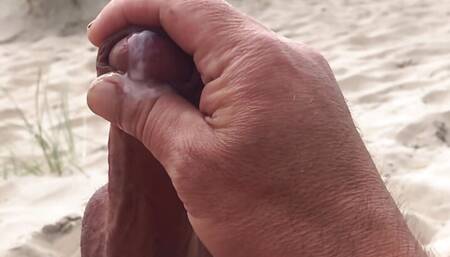 Caught masturbating and cumming on the beach