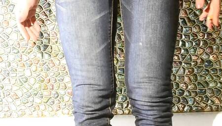 Wetting myself in jeans in bathroom...