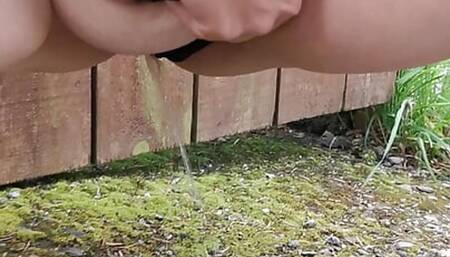 Pissing in neighbours garden after night out