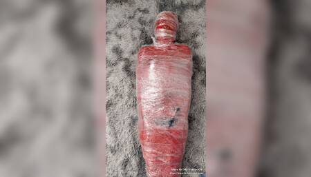 NANA Mummified with red plastic tape and then played with for orgasms