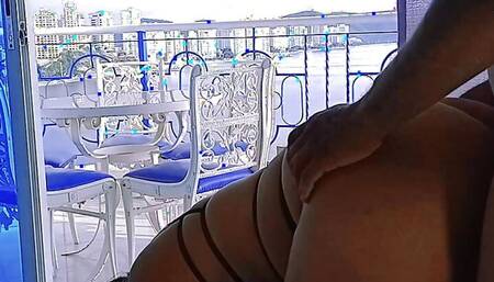 Fucking on the balcony overlooking the bay of Santa Marta, Colombia. I give a blowjob and they cum on my buttocks.