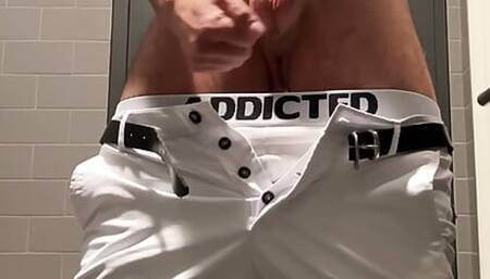 Busting my balls in a public toilet in London