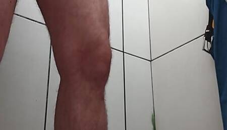 Alberdomonte plays with his stick in a truck driver's bathroom