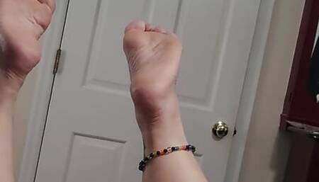 POV milf blowjob while her feet are in the air and she enjoys a vibrator.