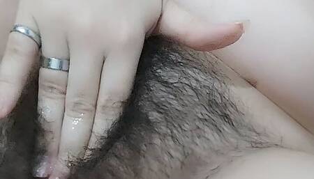 Hairy pussy masturbating