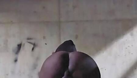 Black CD Pisses In Parking Garage While Smoking
