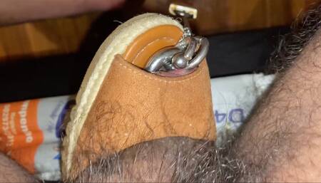 Masturbating with a few different shoes with 8mm pierced cock chained to a lock