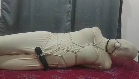 Sissy in zentai training with vibrator
