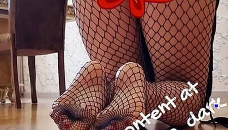 Blonde in fishnets shows her wet pussy and bubble butt