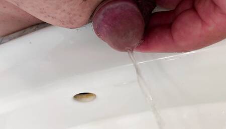 Small penis takes a pee
