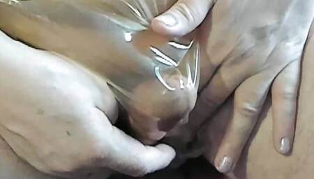 Gummibub plays with his cocklette in transparent rubber pants