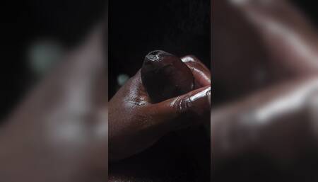 Stroking uncut black Mushroom head cock