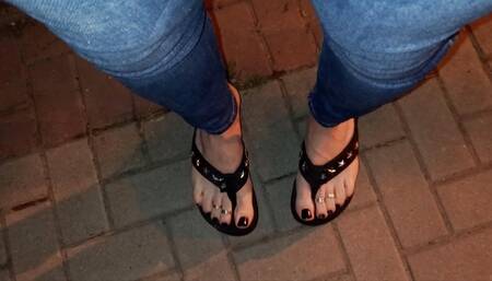 crossdressing on the street in sexy platform thongs and skinny leggings