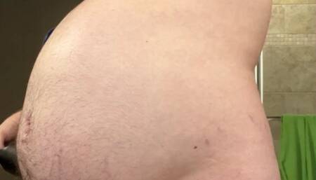 Angus, in the Bathroom, with the Bike Pump