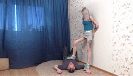 Skinny young miss in short skirt steps on man's chest many times, vf2124x 1080p
